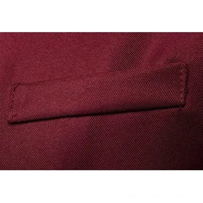 Macro photography of steampunk waistcoat fabric texture showing twill weave and reinforced stitching detail