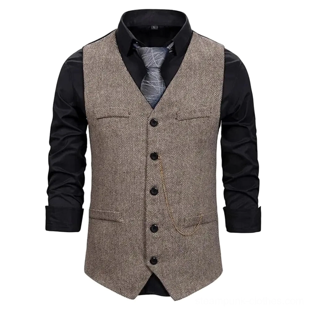 Men's steampunk waistcoat front full view showing brown herringbone fabric with button closure, pocket flaps and decorative gold chain detail on mannequin display