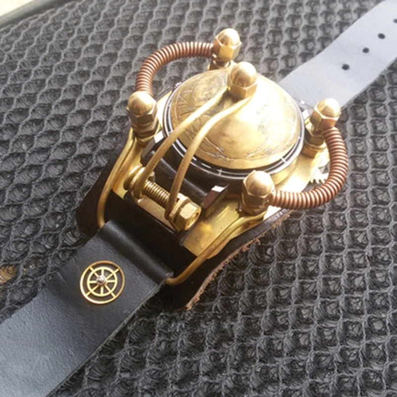 Steampunk enclosed wristwatch with brass protective cover, copper coil detailing, gear accents, and compass emblem on leather strap, top-down view on fabric background