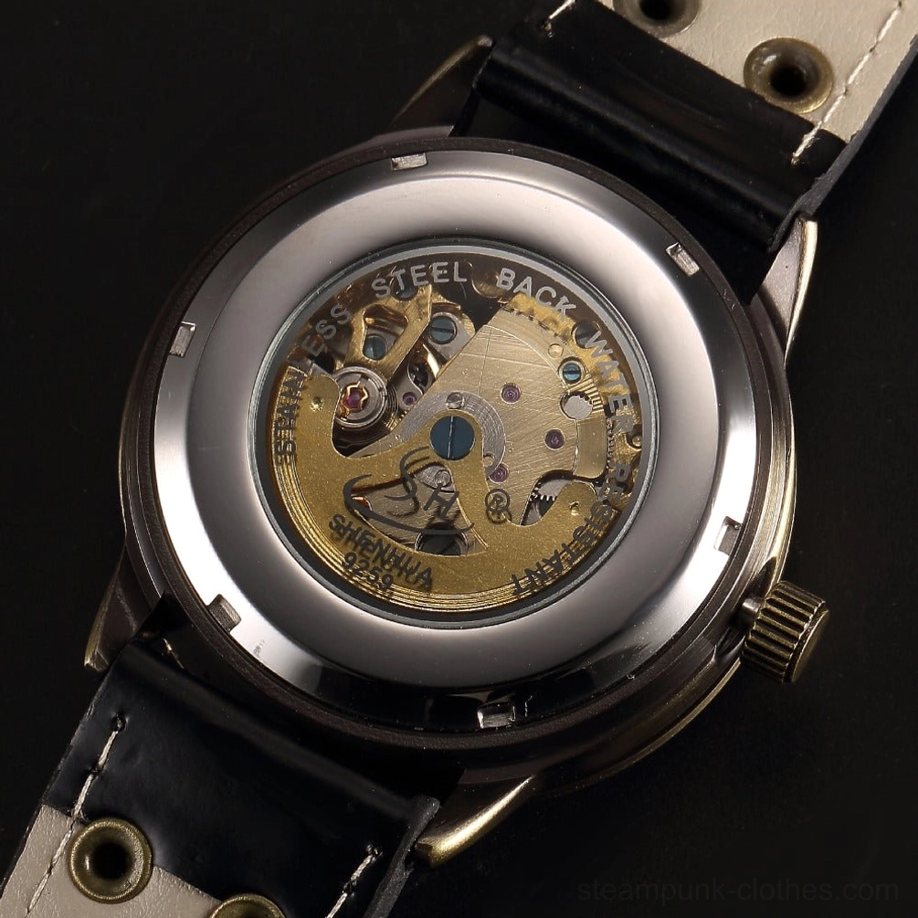 Steampunk watch caseback showing stainless steel exhibition back with 'STEEL BACK' marking and exposed golden mechanical movement visible from behind