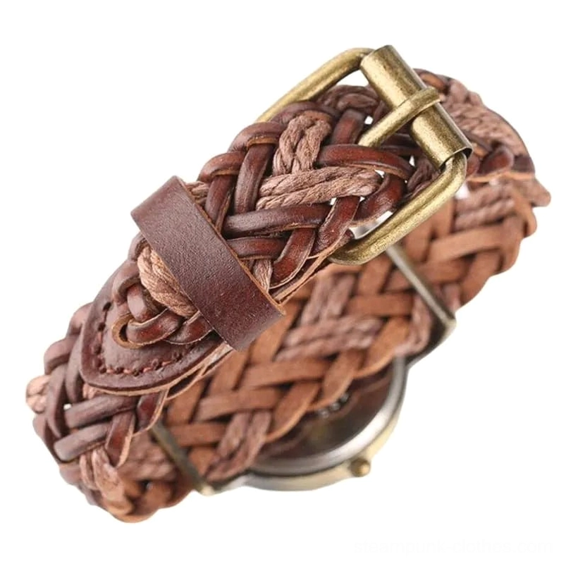 Steampunk leather watch strap with brass metal buckle and accent detail, angled close-up showing braided brown leather craftsmanship on white background