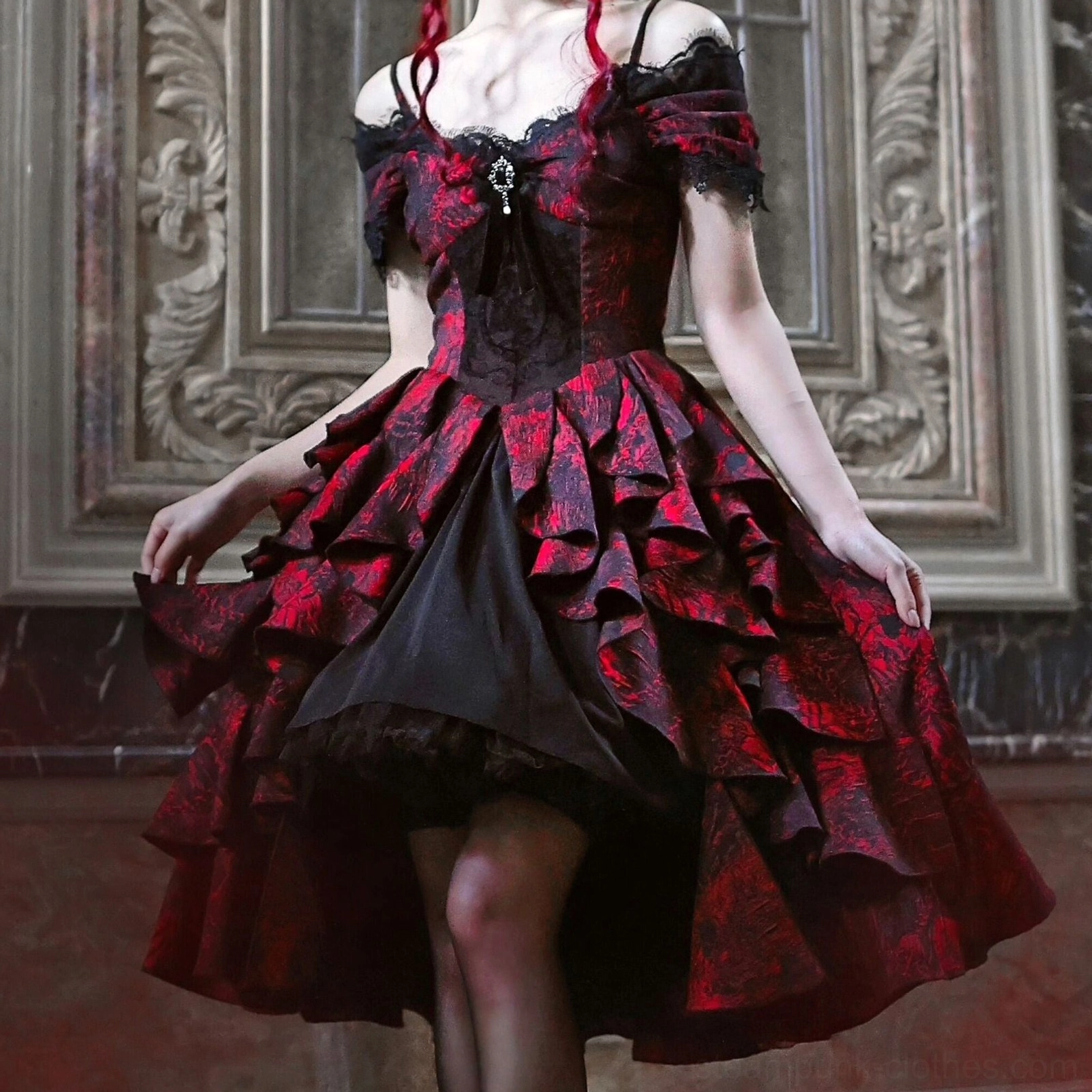 Gothic Victorian steampunk wedding dress with off-shoulder ruffle neckline, red-black jacquard fabric, corset bodice, and high-low asymmetric skirt—front view