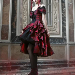 Steampunk bridal gown side profile showing layered ruffle skirt, black tulle underlayer, lace-trimmed stockings, and burgundy gothic boots