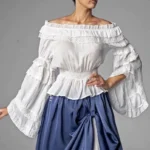 Off-shoulder white silk chiffon ruffle blouse front view on model, showcasing cascading ruffles, lace trim accents, and flared bell sleeves with smocked waist detail - steampunk Victorian blouse