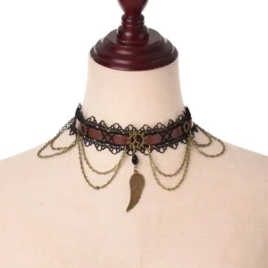 Steampunk wing lace choker necklace front view with bronze wing pendant and layered chains on fabric mannequin