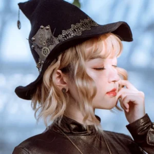 Steampunk witch hat with brass gears and vintage lace, side profile view on blonde model