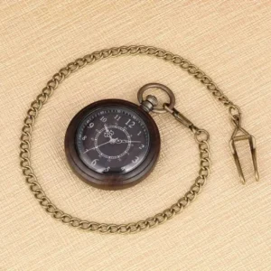 Wooden pocket watch with bronze curb chain overhead view, showing retro dial scale design and intricate bronze metal detailing on dark wood case