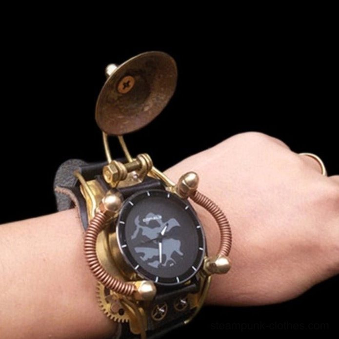 Steampunk mechanical wristwatch with exposed gears and brass components, worn on left hand with vintage ring, displaying oblique side view of copper coil detailing against dark background