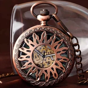 Sunburst skeleton steampunk pocket watch with carved floral copper case front close-up view