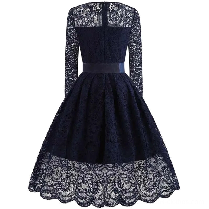 Veronica navy blue vintage-inspired steampunk dress back view revealing hidden zipper and scalloped skirt hem