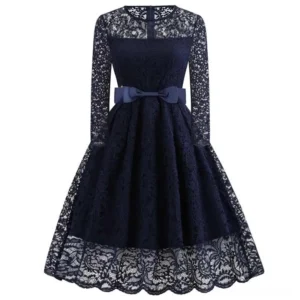 Veronica navy blue steampunk dress with sheer lace sleeves and bow waist detail, front view on white background