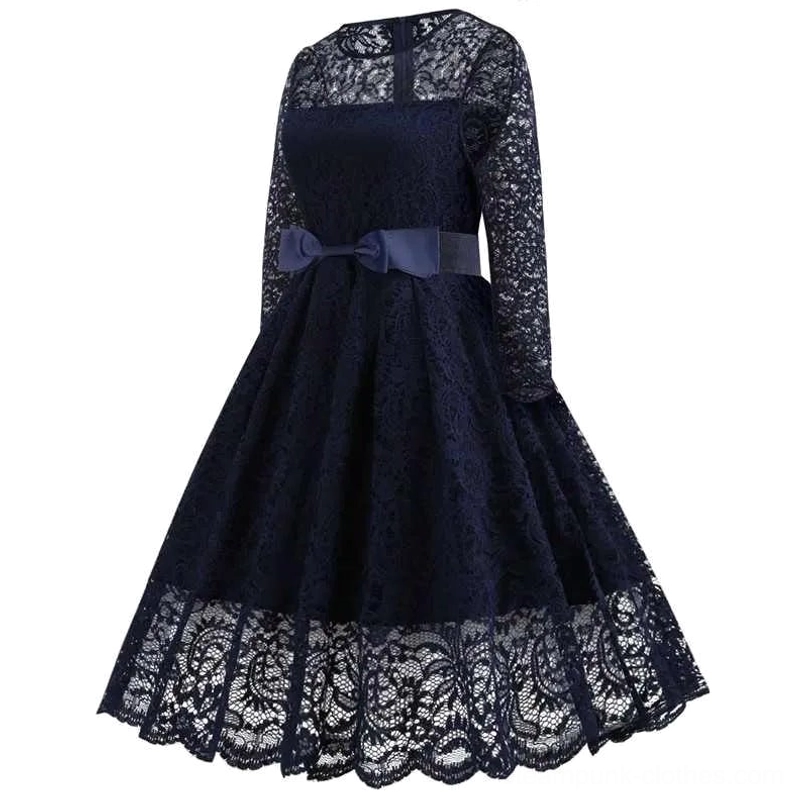 Veronica navy steampunk A-line dress side view showing structured silhouette and scalloped hem detailing