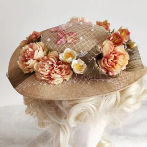 Victorian floral hat with fishnet veil and pearl accents, burlap fabric construction, top rear view showing flower clusters and delicate netting detail