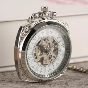 Mechanical steampunk pocket watch three-quarter side view showing ornate silver casing and transparent crystal dial with visible internal gears