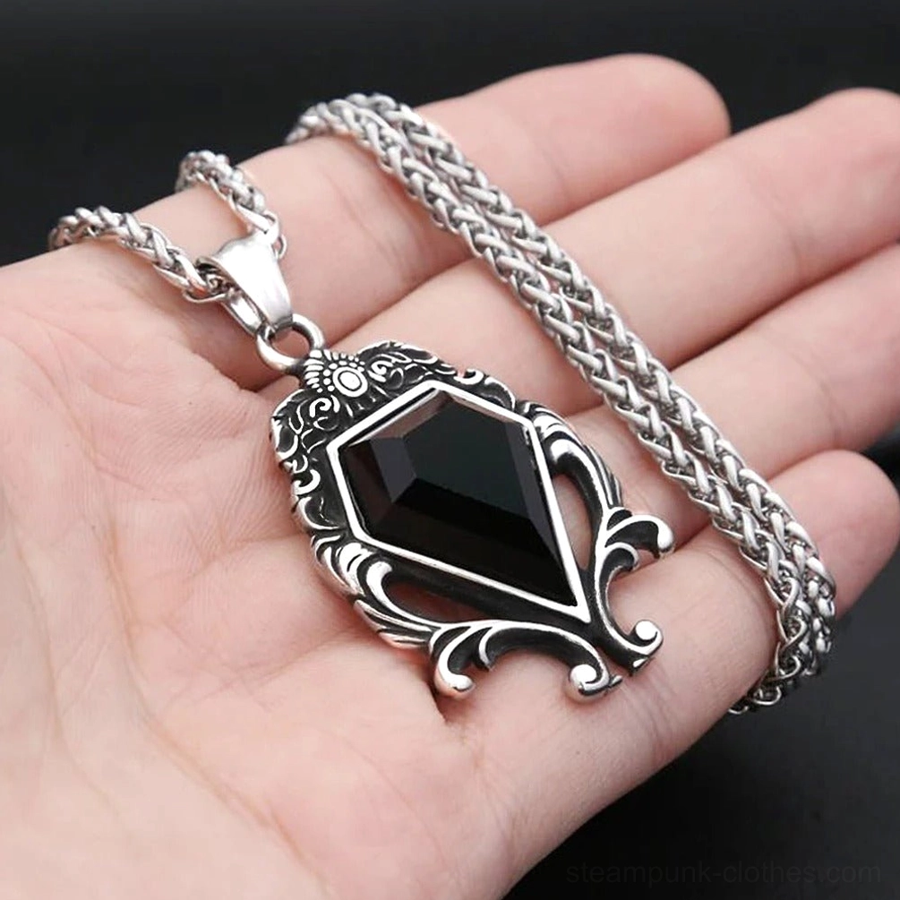 ornate gothic necklace braided silver chain kite cut black stone intricate scrollwork detail