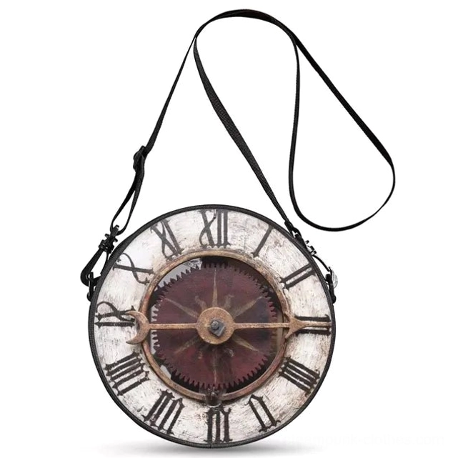 Vintage steampunk clock crossbody bag with Roman numeral dial, exposed brass gears, distressed white finish, black adjustable strap, front view showcase on white background