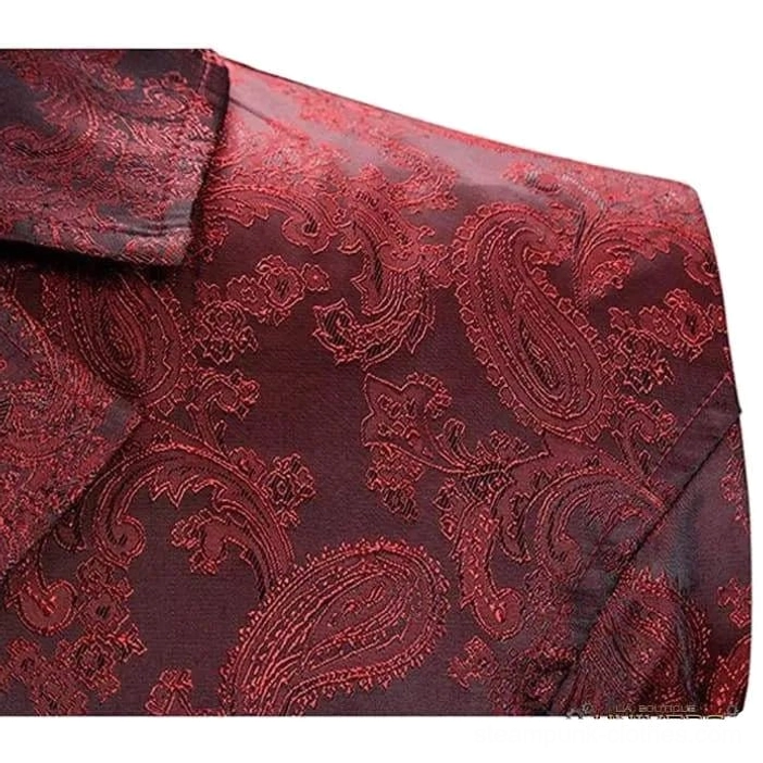 Waistcoat collar close-up detail showcasing paisley jacquard texture and notched lapel construction in deep wine-red color with intricate woven pattern