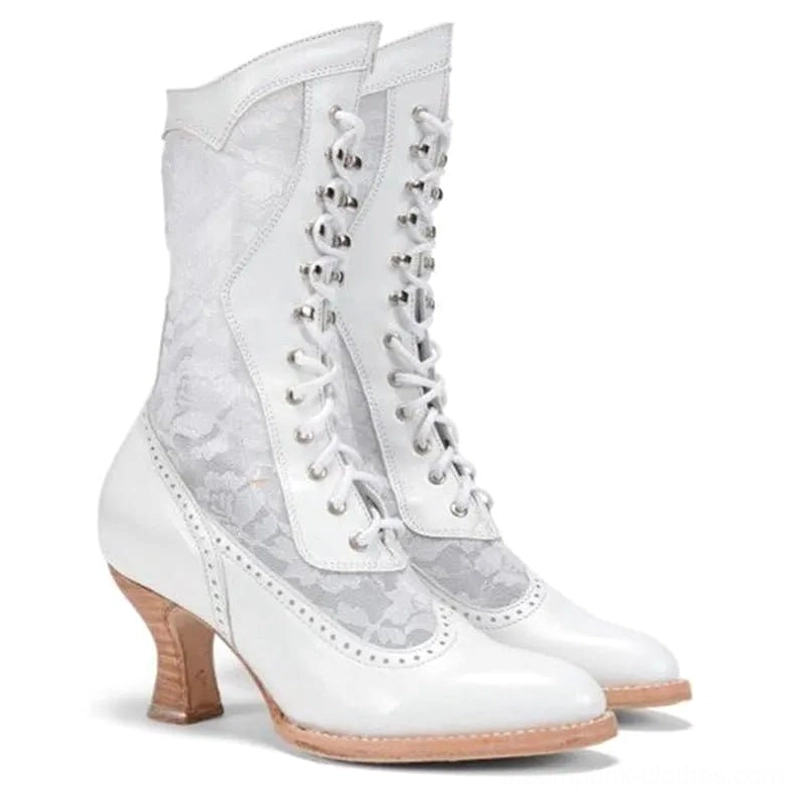 White steampunk boots with leather and lace construction, pointed toe silhouette, front three-quarter view on white background